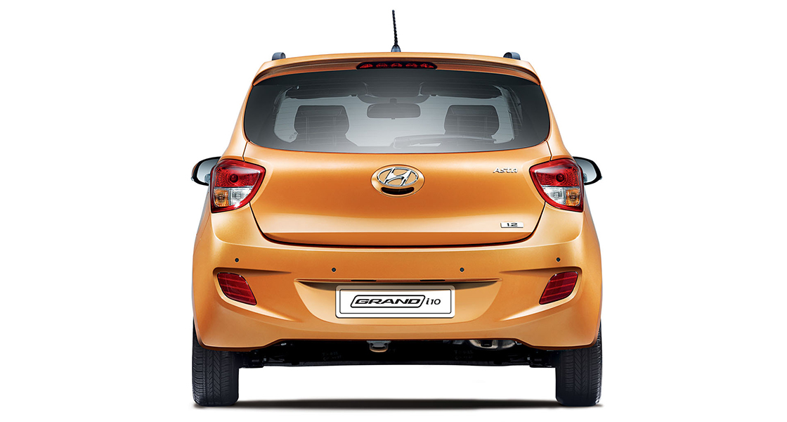 Rear view of orange Grandi10